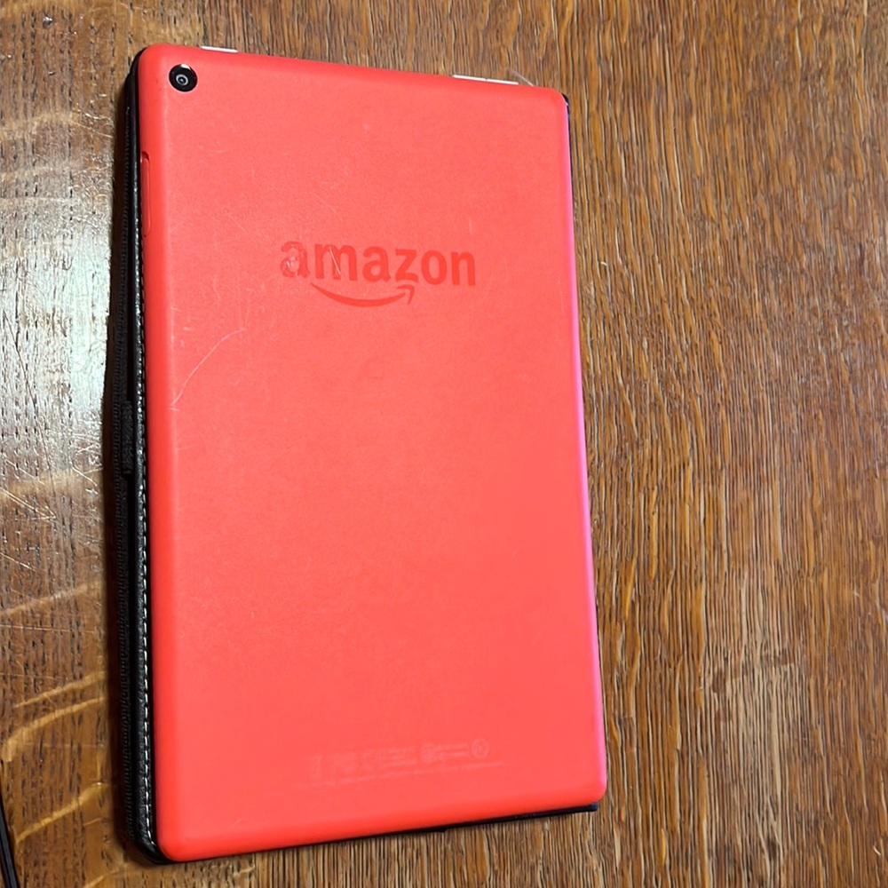 Kindle fire (8) 9th gen. Burnt orange. 7 in display.
